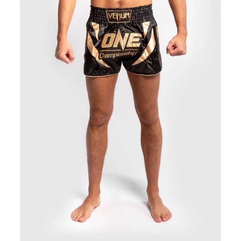 Calças Venum Muay Thai X One FC (ouro)