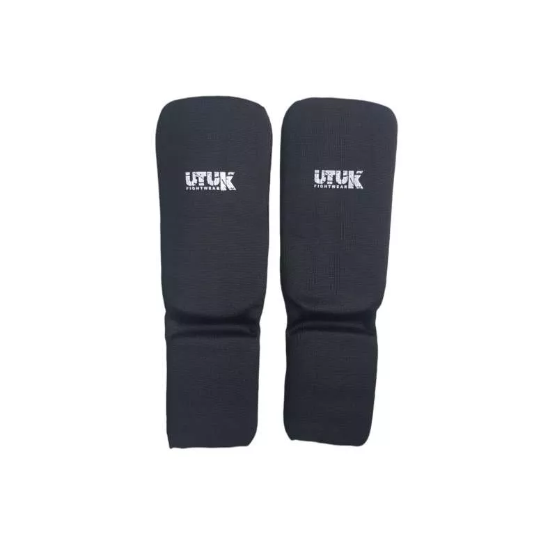 Espinilleras muay thai infantil Utuk (tubular)